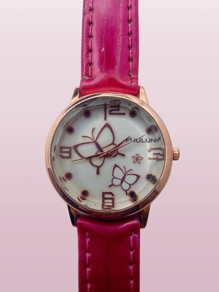 pink watch with butterflies with pink backround