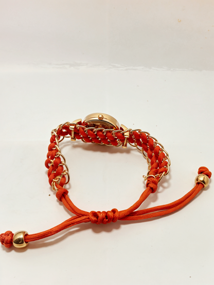 red ribbon wath with gold bracelet back side