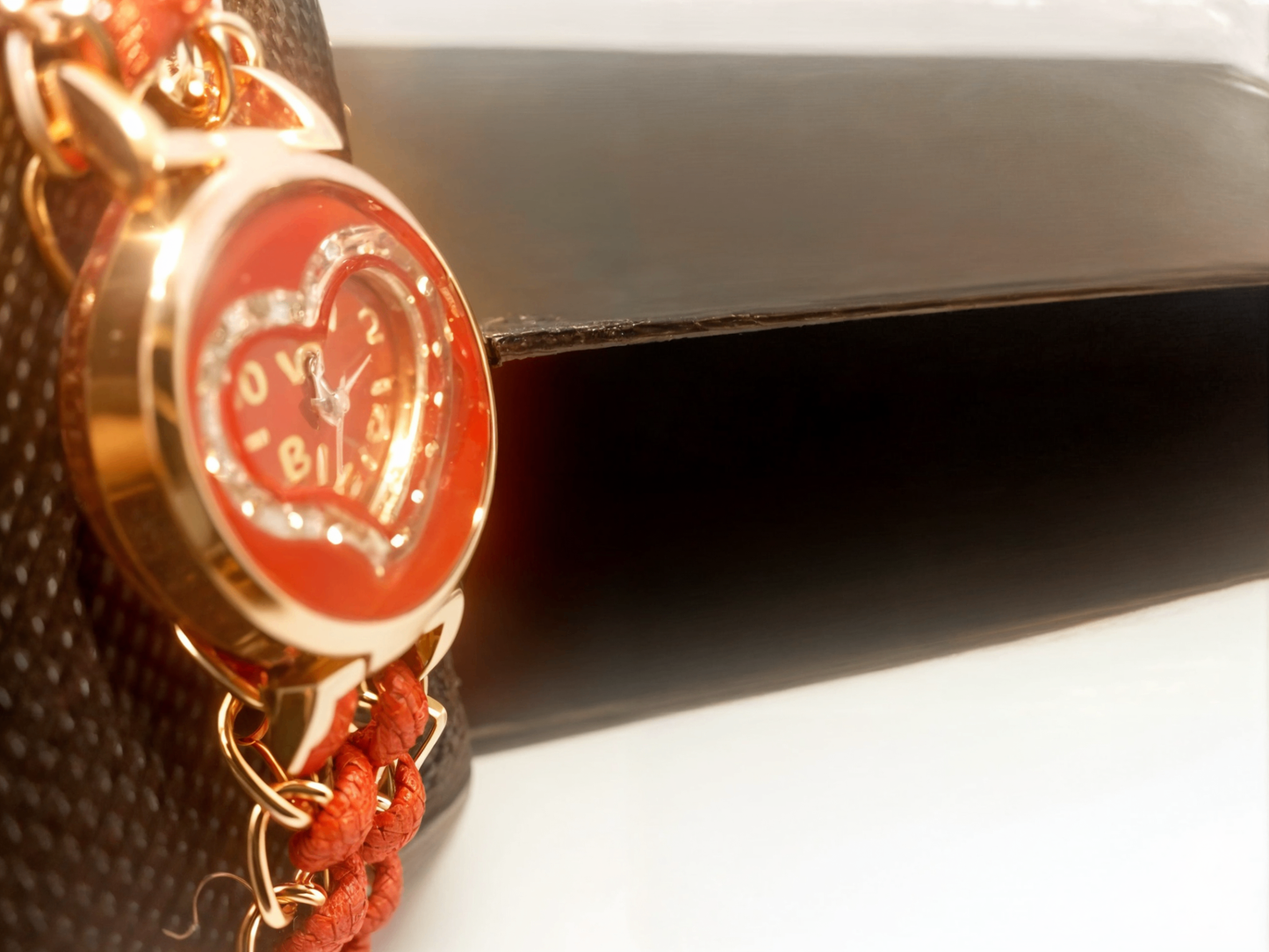 red bracelet watch side view